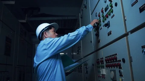An asian senior computer engineer operating computer server Video stock 116751647