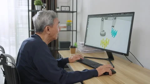 Asian Senior Developer using Computer to Designer Robot Arm at Home. Vídeos de archivo 203913883