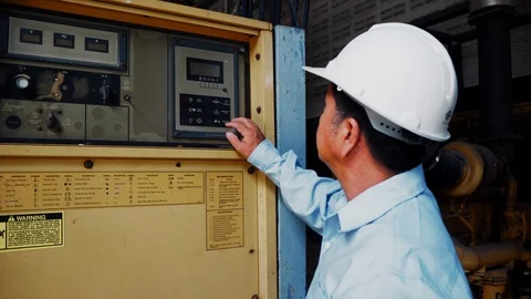 An asian senior engineer using industrial power generator Video stock 116750891