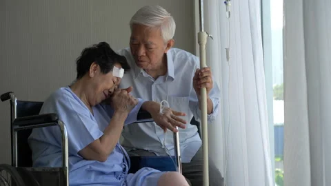 Asian senior love couple support care husband visit accident injure wife at.. Stock Footage 242839341
