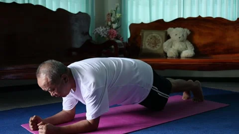 Asian senior man Doing exercise at home Video stock 251152539