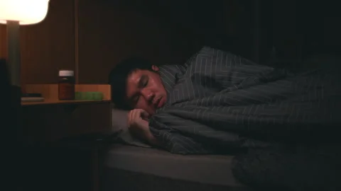 Asian sick man coughing while sleeping at night in the bedroom. Stock Footage 266894415