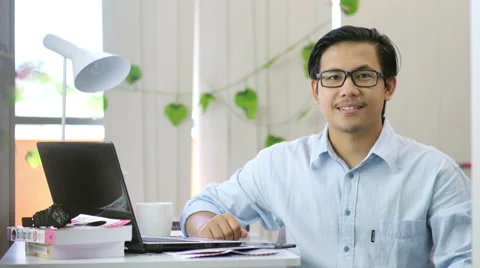 Asian Smiling To The Camera - 4K Resolution Stock Footage 60608013
