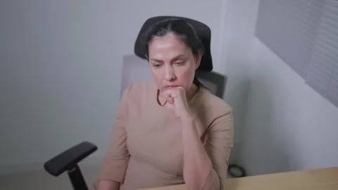 Asian software developer focused on coding a floating program and smiling sittin Stock Footage 270289096