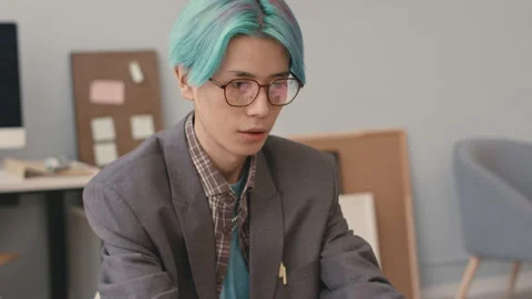 Asian Software Developer Working in Office Stock Footage 241270005