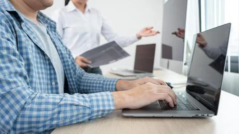 Asian Software engineer Programmer team working together on project of the Sy 写真素材