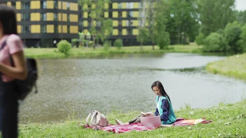 Asian student preparing for classes outdoors Stock Footage 112321353