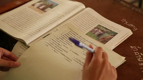Asian Student Working On School Work In Chiang Rai 스톡 동영상 30141851