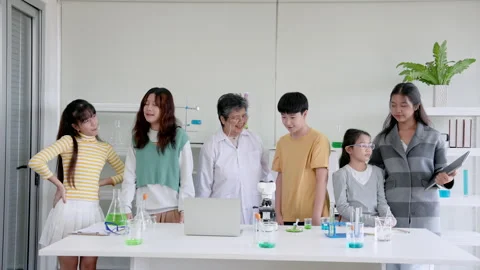 Asian students different ages come study science subjects, on weekends Stock Footage 255719294