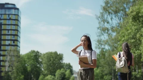 Asian students walking after classes Stock Footage 112321647