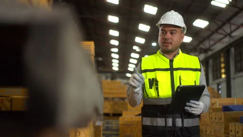 Asian supervisor man using tablet working at store industry. Technician worker. Stock Footage 287473405