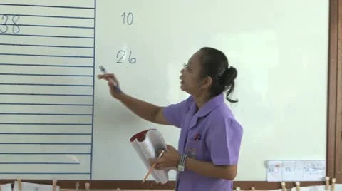 Asian Teacher Teaching In The Classroom 스톡 동영상 12436351