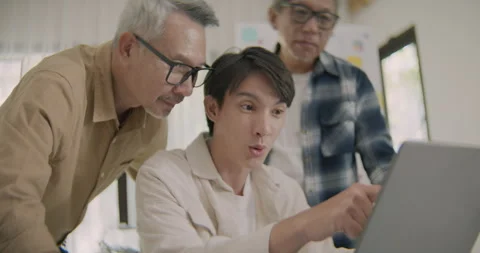 Asian Team Excited Over Software Progress at Home Office. Stock Footage 308156267