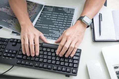 Asian team Outsource Developer Looking Screen Programming Code Working with L Stock Photos