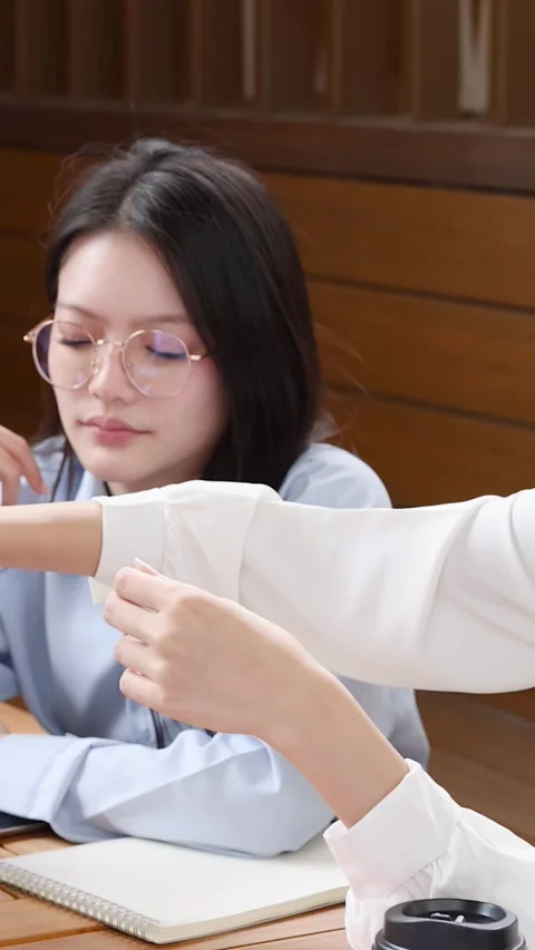Asian Tech Engineers Demonstrating Robotic Dog Prototype in Office Meeting Stock Footage 346283064