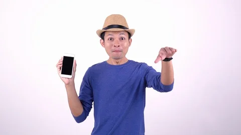 Asian Thai tourist using smart phone for shopping on line on white background Stock Footage 118899790