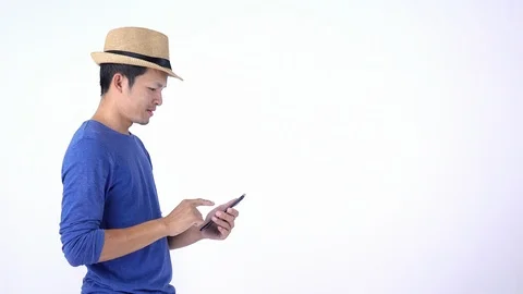 Asian Thai tourist using smart phone for shopping on line on white background Stock Footage 119049659