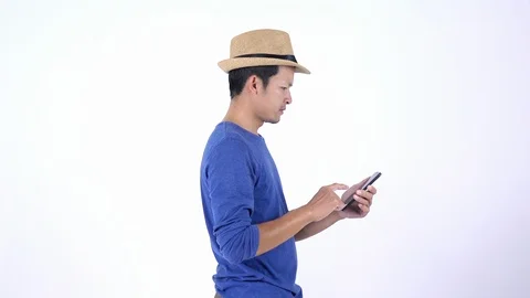 Asian Thai tourist using smart phone for shopping on line on white background Stock Footage 119050002