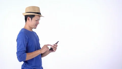 Asian Thai tourist using smart phone for shopping on line on white background Stock Footage 119050168