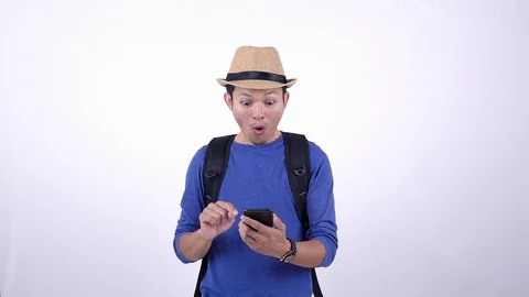 Asian Thai tourist using smart phone for shopping on line on white background Stock Footage 119676087