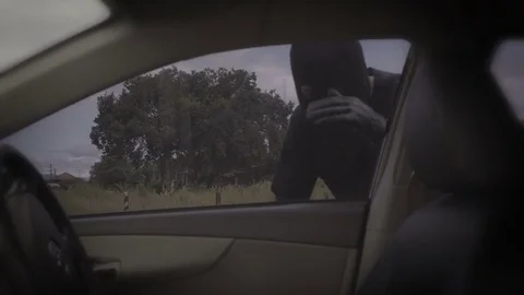 Asian Thief Stealing Bag From The Car Stock Footage 81234960