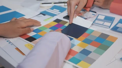 Asian uxui designer working on website design using sticky notes and wirefram Stock Footage 332275225