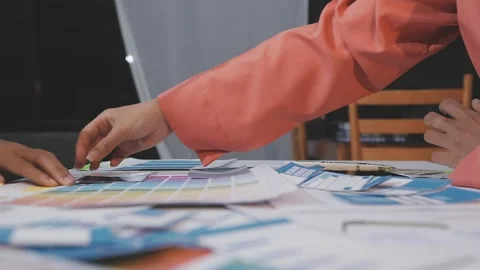 Asian uxui designer working on website design using sticky notes and wirefram Stock Footage 332275242
