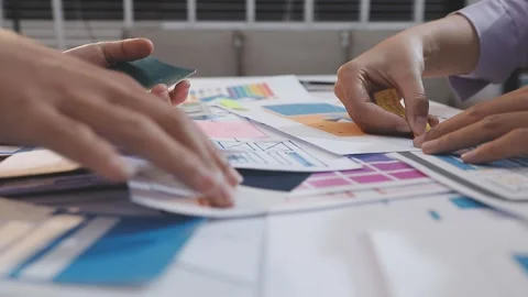 Asian uxui designer working on website design using sticky notes and wirefram Stock Footage 332275255