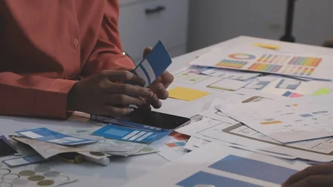 Asian uxui designer working on website design using sticky notes and wirefram Stock Footage 332275324