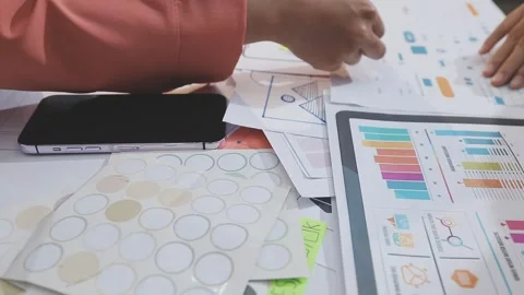 Asian uxui designer working on website design using sticky notes and wirefram Stock Footage 332275340
