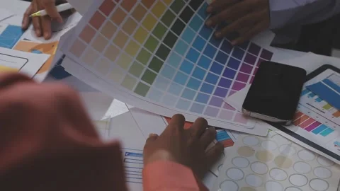 Asian uxui designer working on website design using sticky notes and wirefram Stock Footage 332275368