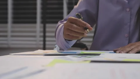 Asian uxui designer working on website design using sticky notes and wirefram Stock Footage 332275598