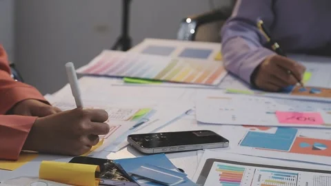 Asian uxui designer working on website design using sticky notes and wirefram Stock Footage 332275675