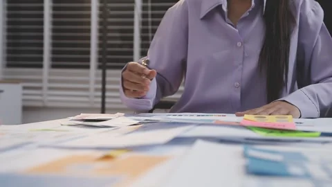 Asian uxui designer working on website design using sticky notes and wirefram Stock Footage 332276076