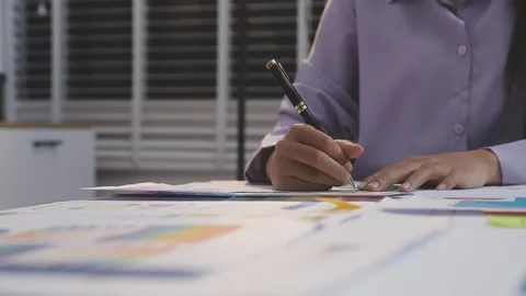 Asian uxui designer working on website design using sticky notes and wirefram Stock Footage 332276207