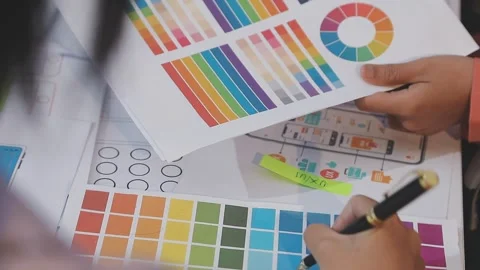Asian uxui designer working on website design using sticky notes and wirefram Stock Footage 332276211