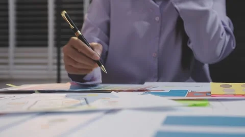 Asian uxui designer working on website design using sticky notes and wirefram Stock Footage 332276228