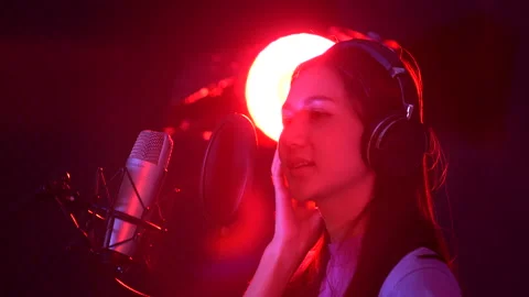 Asian vocalist performing Stock Footage 138314082