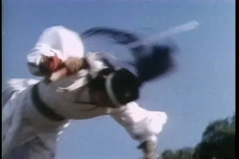 Asian warrior doing triple somersault Stock Footage 11348055
