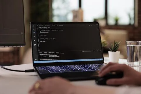 Asian web developer using terminal window Stock Photos
