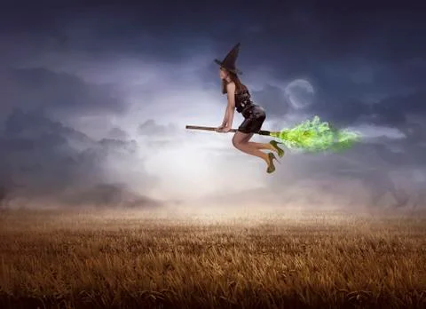 Asian witch using broom flying Stock Photos