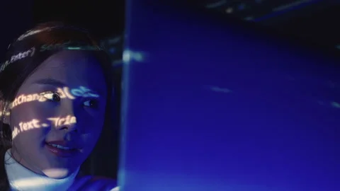 Asian woman analyzing coding or programming. Stock-Footage 229472966