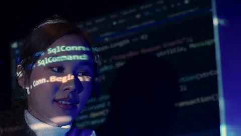 Asian woman analyzing coding or programming. Stock Footage 229473381