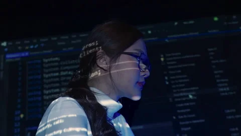 Asian woman analyzing coding or programming. Stock-Footage 229473471