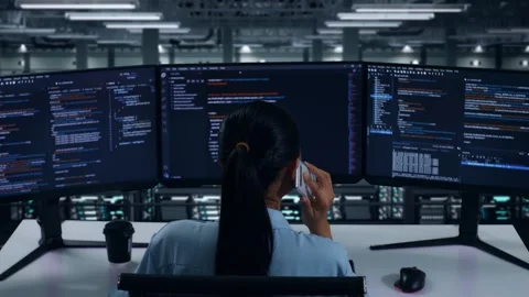 Asian Woman Developer Talking On Mobile Phone While Write Code In Data Center Stock Footage 270230166
