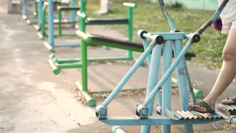 Asian woman doing exercise by using body rider trainer machine Video stock 137012437