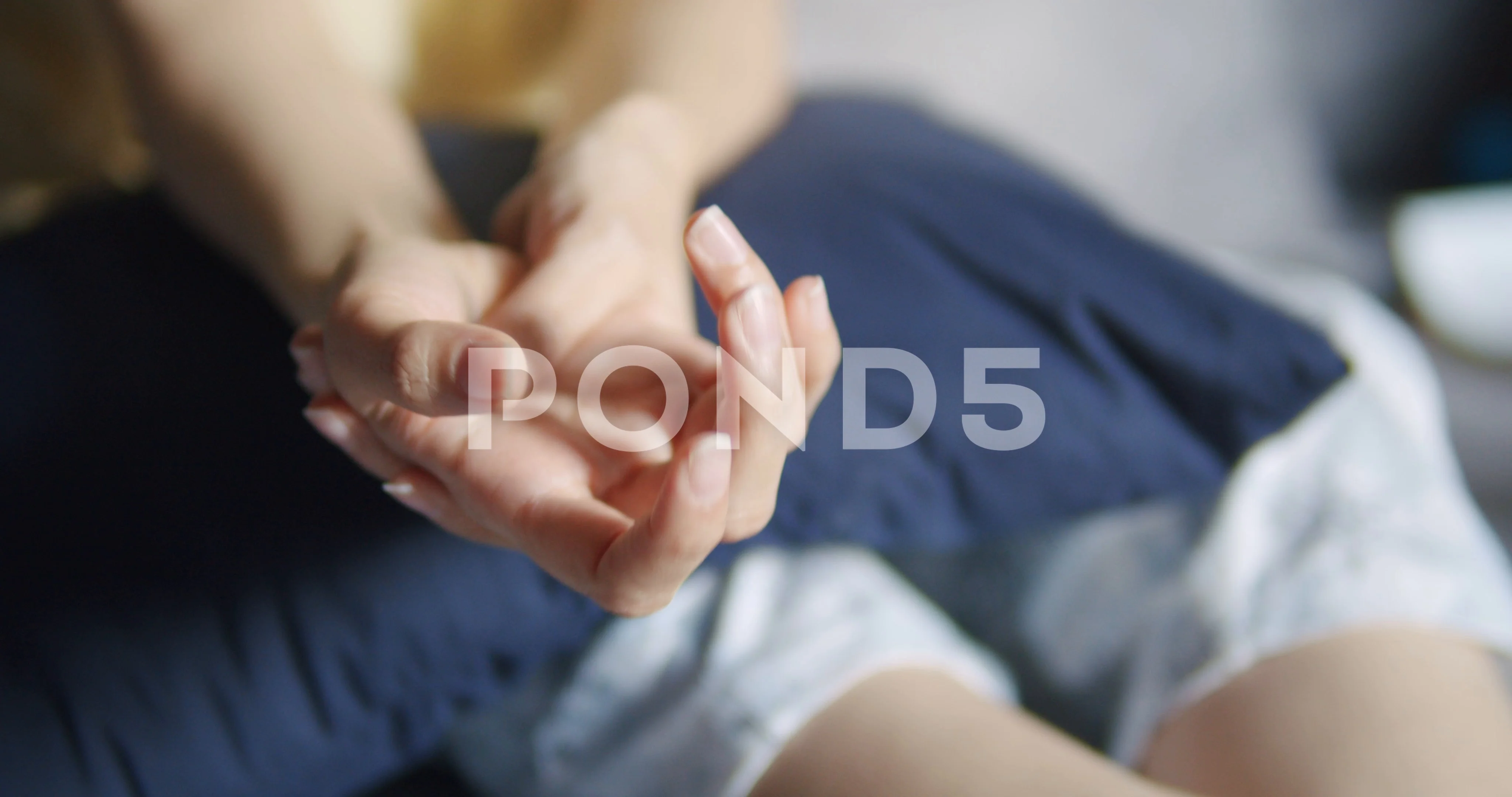 Asian woman massage on her hand pain