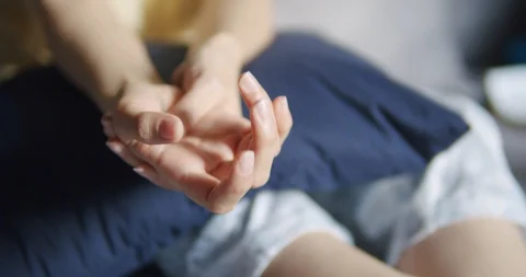 Asian woman massage on her hand pain Stock Footage