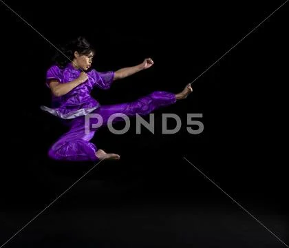 Asian Woman Practicing Martial Arts