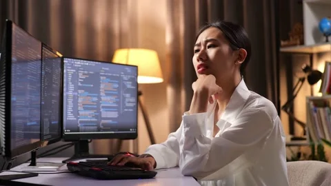 Asian Woman Programmer Thinking About Something While Creating Software Engineer Stock Footage 232034076